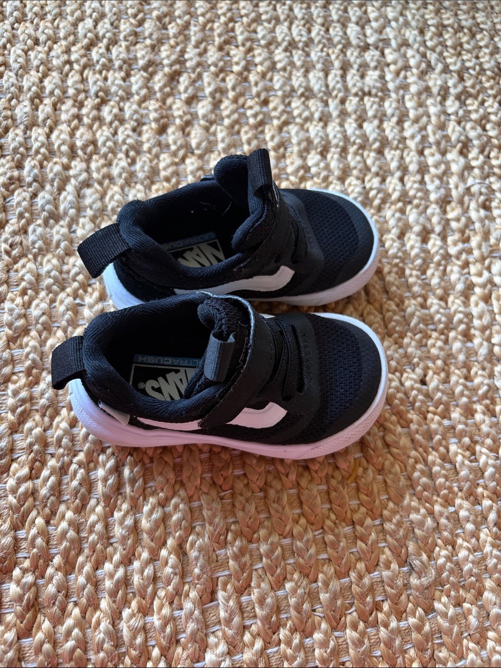 Vans Kids Black and White Slip-On Style Sneakers